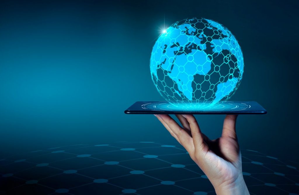 technology trends blue globe hovering over tablet