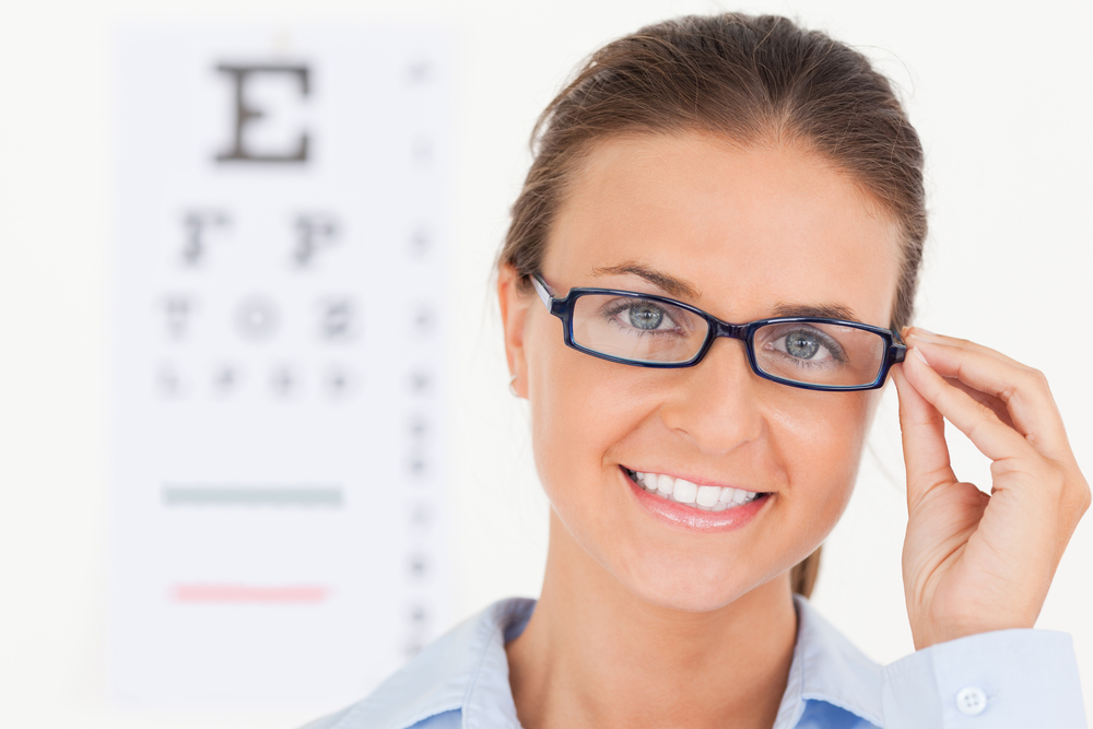 woman eye doctor glasses office