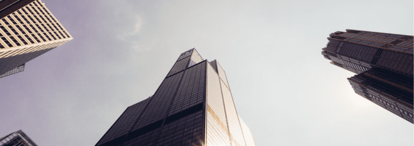 view up of skyscrapers at sunset