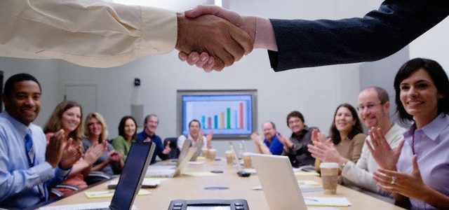 big business team meeting handshake