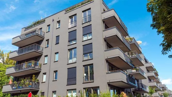 modern grey apartment building seen in berlin
